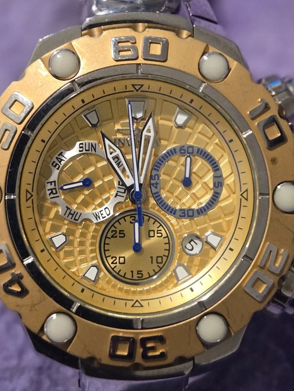 Invicta Gold and Blue Dial Chronograph Watch